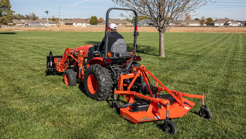 New Land Pride FDR16 Series Grooming Mowers mowing a green plot of land.