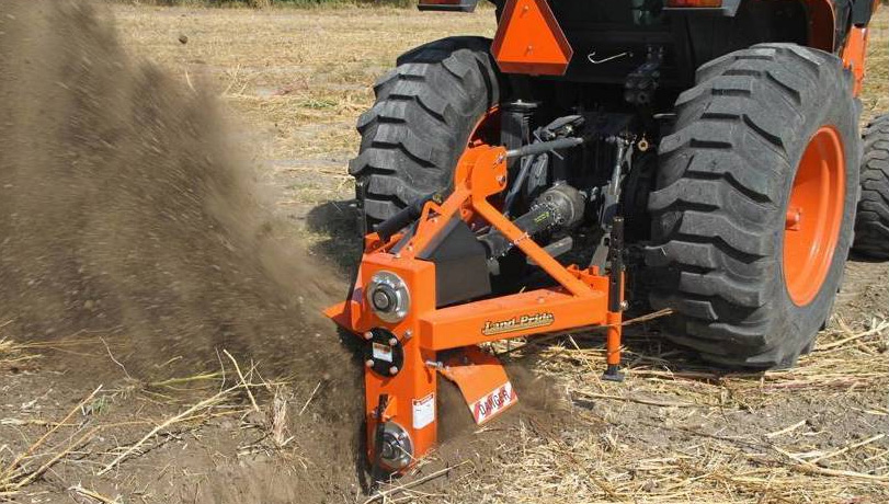 Land Pride Series Ditcher DT35 digging a trench in a field.