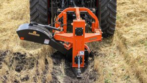 Land Pride Series Ditcher DT55 digging a trench in a field.