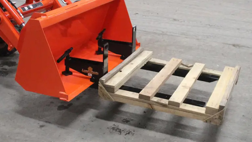 Land Pride PF10 Series Pallet Forks with a wooden pallet.