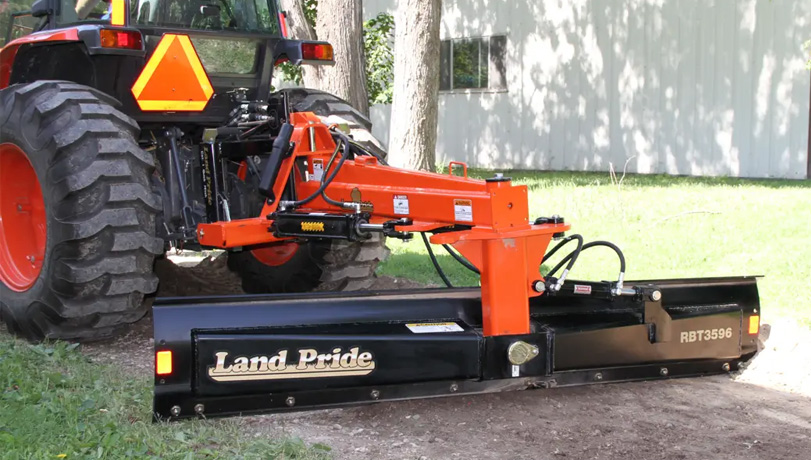 Kubota tractor with a Land Pride RBT35 Series Rear Blade attached to the back.