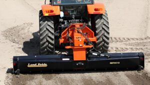 Kubota tractor with a Land Pride RBT60 Series Rear Blade attached to the back.