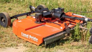 Land Pride RCR2596/RCR2510 Rotary Cutters trimming grass in a field.